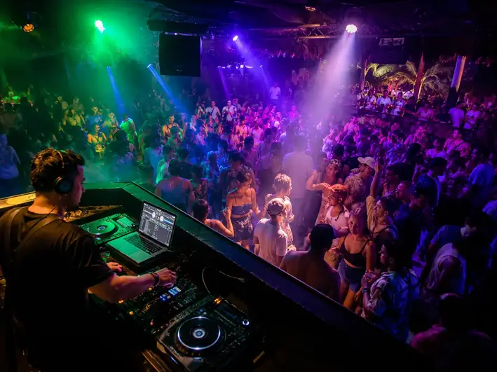 Jacó nightlife — DJ set in a packed club