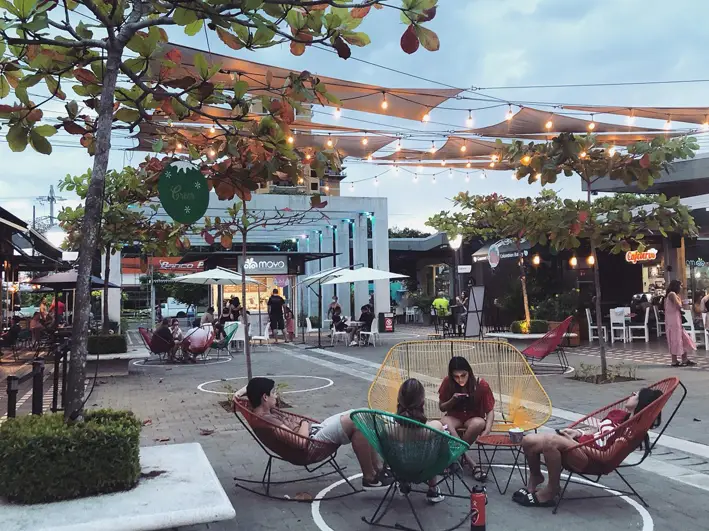 Open-air plaza and food spots in downtown Jacó