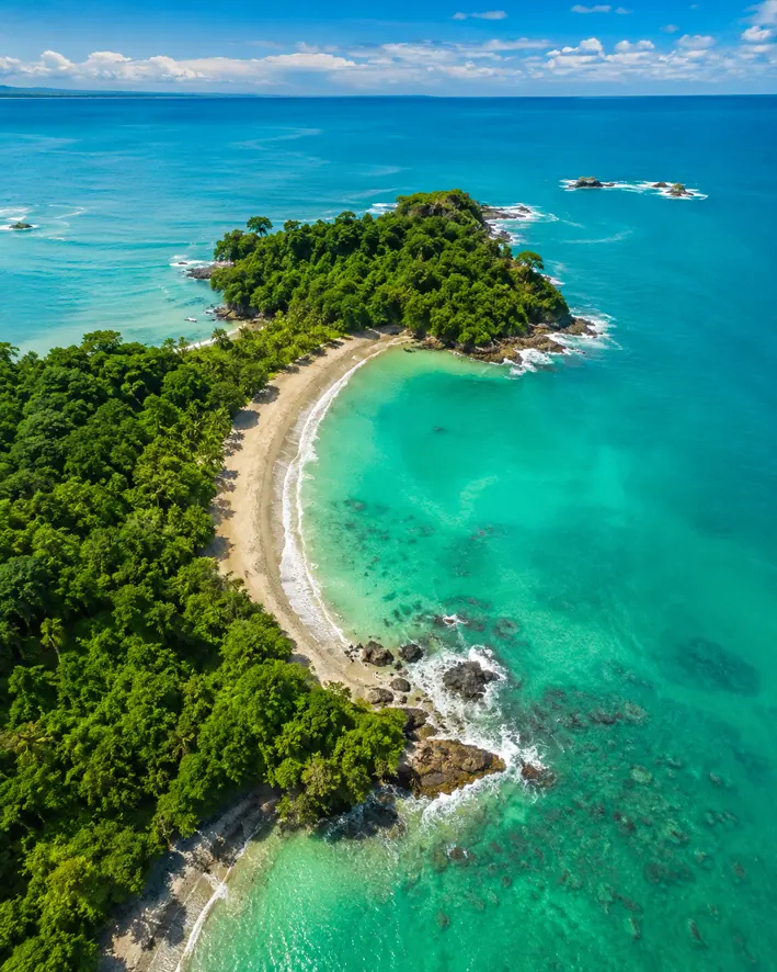 Aerial view of Punta Catedral and the beaches of Manuel Antonio