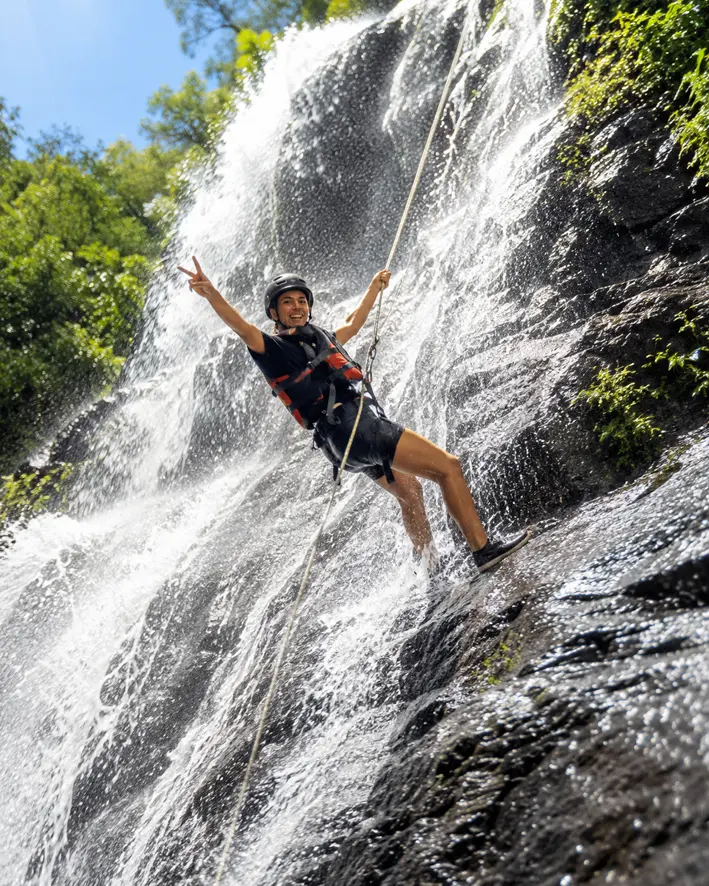 Waterfall rappelling in the jungle near Quepos